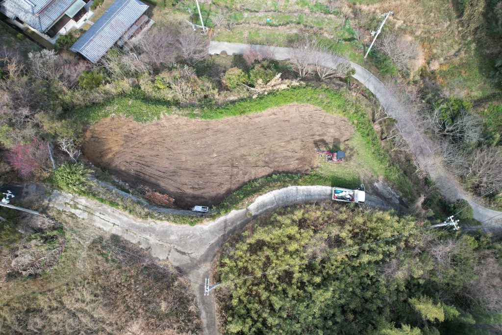 Drone aerial view of cleared building site on Awajishima prior to construction commencement at Vista Wellmina Villa