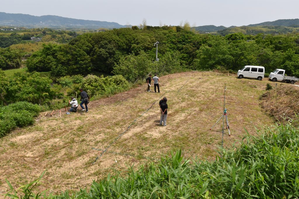 Land surveyors establishing site boundaries at Vista Wellmina Villa, Awajishima — required for both ownership definition and architect design commencement