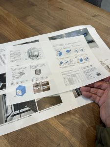 Reviewing Japanese unit bath technical drawings during renovation planning
